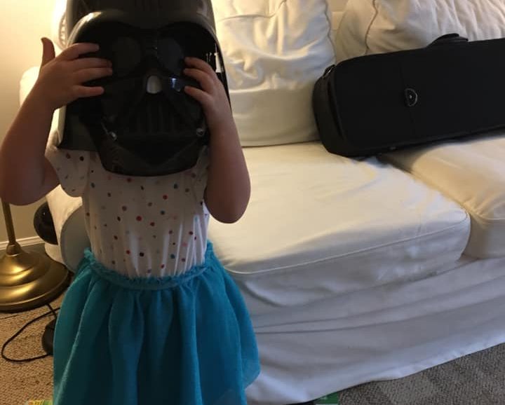 girl with Darth Vader mask